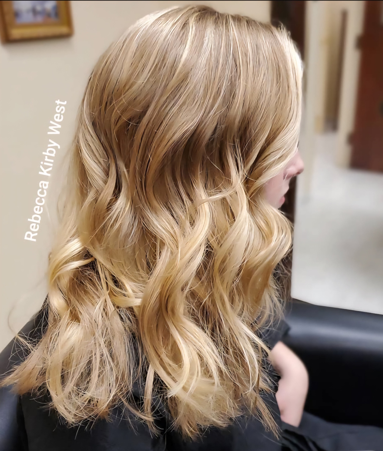 Perfect color matching between natural hair and extensions demonstrating expert technique